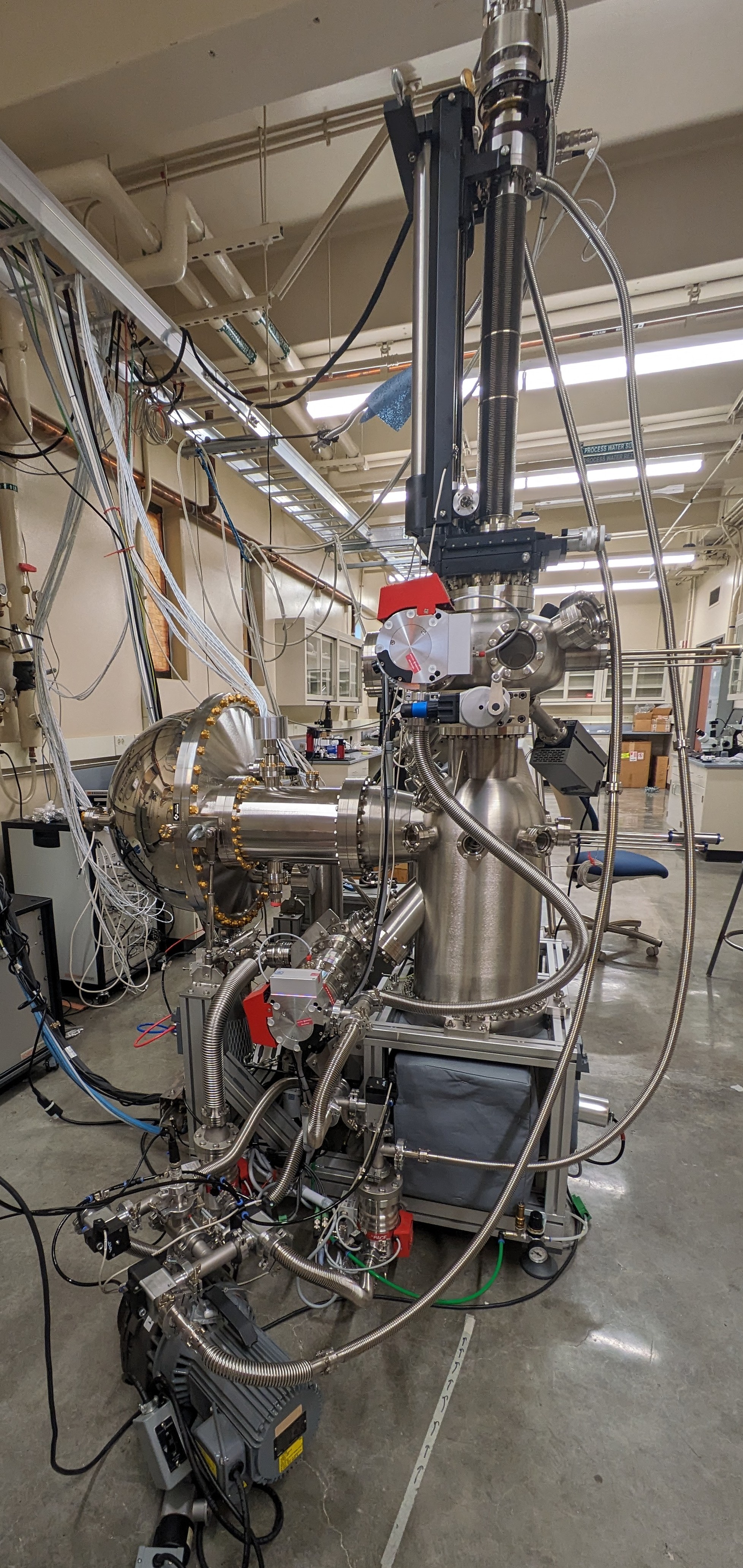 A spectroscopy instrument sits in the lab of Inna Vishik, surrounded by other equipment. 