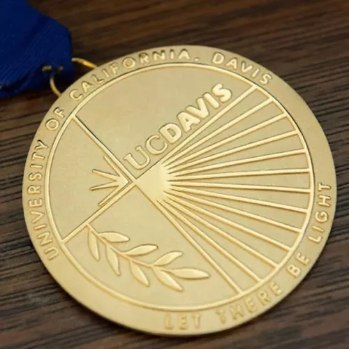 A gold UC Davis medal 