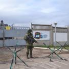Russian troops block the Ukrainian military base in Perevalne 