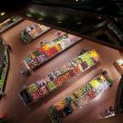 An overhead view of the produce section of a grocery store. 