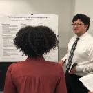 Zaid Arroyos, a political science major in the College of Letters & Science, presents his research project "Can we laissez-faire our way out of a housing crisis?" at the UC Center Sacramento Undergraduate Research Showcase.