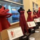 Red dresses created by Design faculty and students in previous years were exhibited outside of the ARC ballroom.